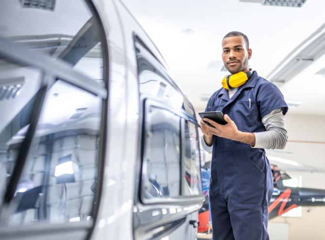 Engineer working in an air vehicle hanger